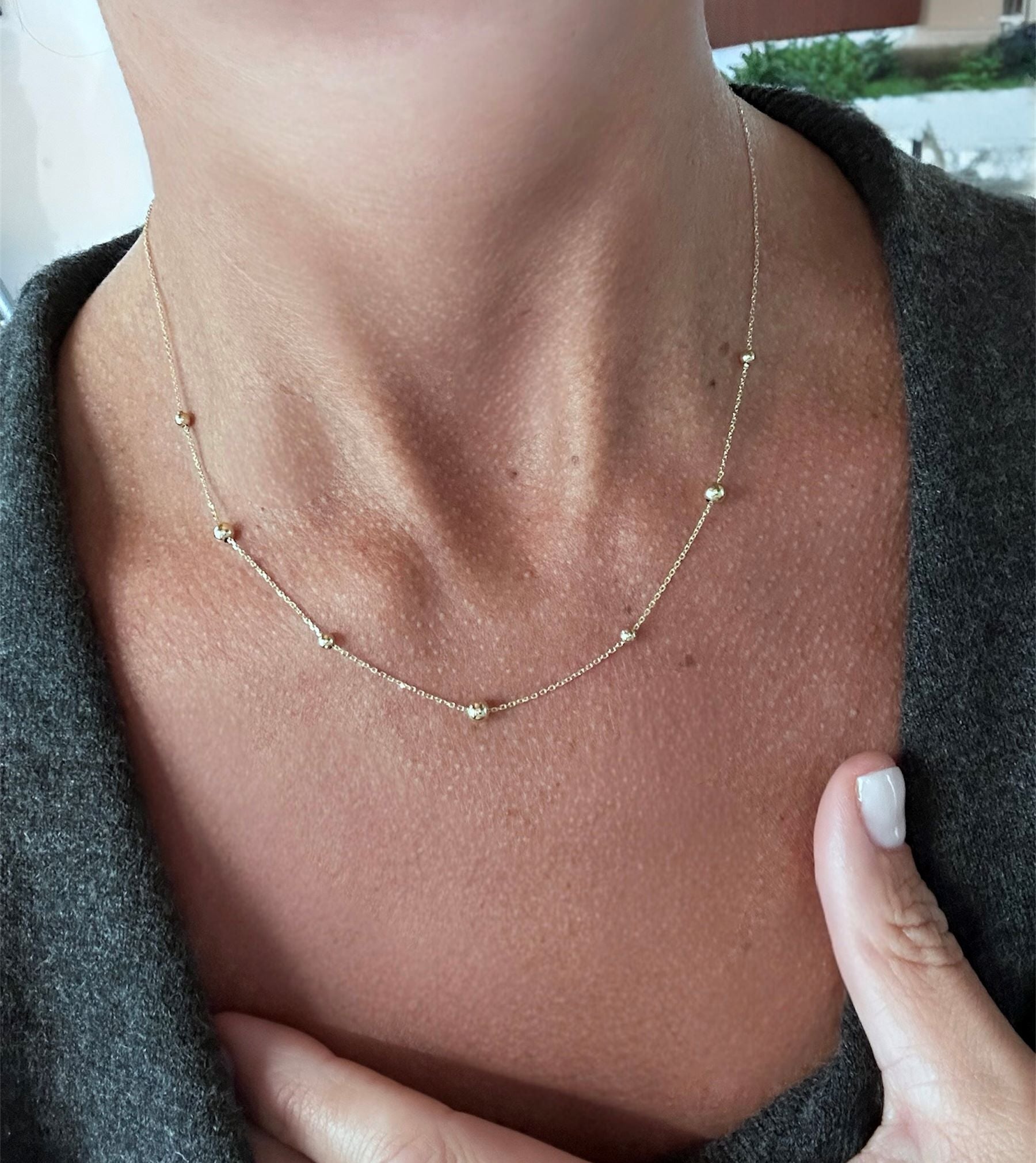 Collana in oro giallo 9 kt con piccole sfere